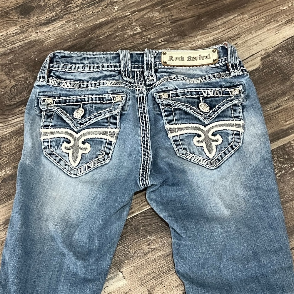 Rock Revival Light Blue Denim bootcut Jeans with Embroidered Pockets